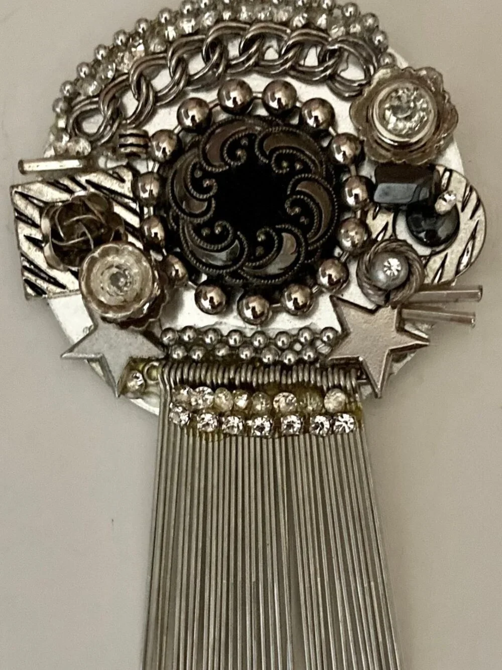 ONE OF A KIND BROOCH MADE FROM ASSORTED SILVER FINDINGS-LOCALY MADE IN USA